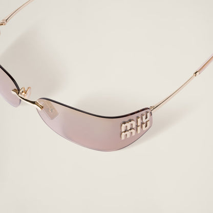 Side profile of the Aube Sunglasses showing the sculpted lens shape.
