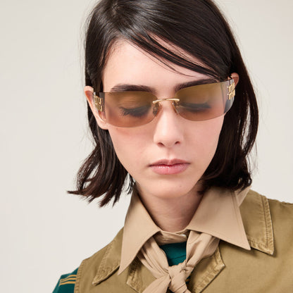 Softly tinted lenses on the Aube Sunglasses in a timeless silhouette.